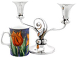 American Sterling Silver Candelabra next to a mug