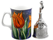 Victorian Table Bell in Sterling Silver next to a mug