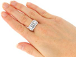 wearing Vintage Emerald Cut Diamond Cluster Ring