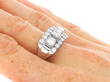 Vintage Emerald Cut Diamond Cluster Ring on finger