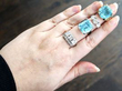 rings stacked on finger