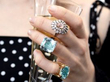 gemstone rings on hand