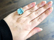 Cushion Cut Aquamarine Ring in Yellow Gold wearing