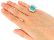 Cushion Cut Aquamarine Ring in Yellow Gold on hand