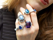 gemstone rings being worn