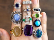 gemstone rings on hand