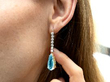 wearing Pear Cut Aquamarine Drop Earring with Diamonds