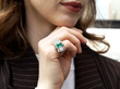 wearing octagonal emerald ring