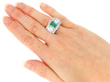 Octagonal Cut Emerald and Diamond Ring in Platinum wearing