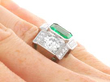 Octagonal Cut Emerald and Diamond Ring in Platinum on hand