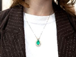 wearing Antique Pear Cut Emerald Pendant