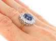 Sapphire and Diamond Cluster Ring in Yellow Gold on hand