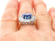 Sapphire and Diamond Cluster Ring in Yellow Gold on finger