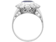 setting of Bezel Set Sapphire Cluster Ring in White Gold