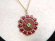 Peridot and Pearl Plique a Jour Pendant being worn