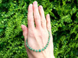 Emerald and Pearl Single Strand Bead Necklace outside