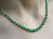 wearing Emerald and Pearl Single Strand Bead Necklace