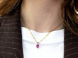 Cushion Cut Pink Sapphire Pendant being worn