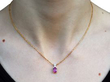 wearing Cushion Cut Pink Sapphire Pendant