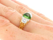 Antique Demantoid Garnet Ring in Yellow Gold on hand
