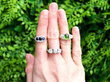 trilogy rings on hand outside
