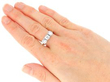 Platinum Diamond Trilogy Ring on hand