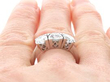 Platinum Diamond Trilogy Ring on finger