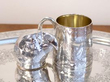 silver christening mug and parrot snuff box