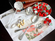 silver flatware nut cracker and strawberry dish