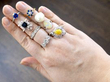 gemstone rings on hand