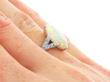 1920s White Opal Ring with Diamonds in Platinum on hand
