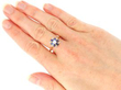 wearing Floral Sapphire Ring in Yellow Gold