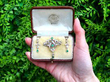 Antique Emerald and Diamond Pendant Brooch and earring set outside