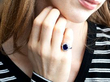 sapphire and diamond ring on hand
