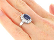 Blue Sapphire and Diamond Platinum Cluster Ring on hand