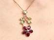 Antique Garnet Pendant with Peridot in Rose Gold being worn