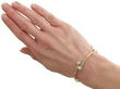 Antique Diamond Crossover Bangle in yellow gold wearing