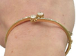 Antique Diamond Crossover Bangle being worn