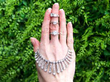diamond rings and diamond necklace outside