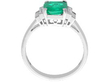 setting of Emerald Ring with Baguette Diamonds in Platinum