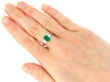 wearing Emerald Ring with Baguette Diamonds in Platinum
