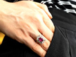 Ruby Cluster Ring with Baguette Diamonds being worn