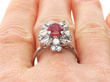 Ruby Cluster Ring with Baguette Diamonds on finger