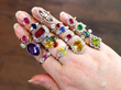 gemstone rings on hand
