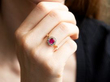 Bezel Set Ruby Cluster Ring in Gold wearing