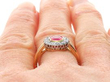 Bezel Set Ruby Cluster Ring in Gold being worn