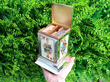 silver playing card box outside