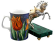 Silver Horse Sculpture on Malachite Base next to a mug