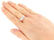 yellow gold Round Brilliant Cut Diamond Trilogy Ring on hand