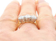 yellow gold Round Brilliant Cut Diamond three stone Ring on finger
